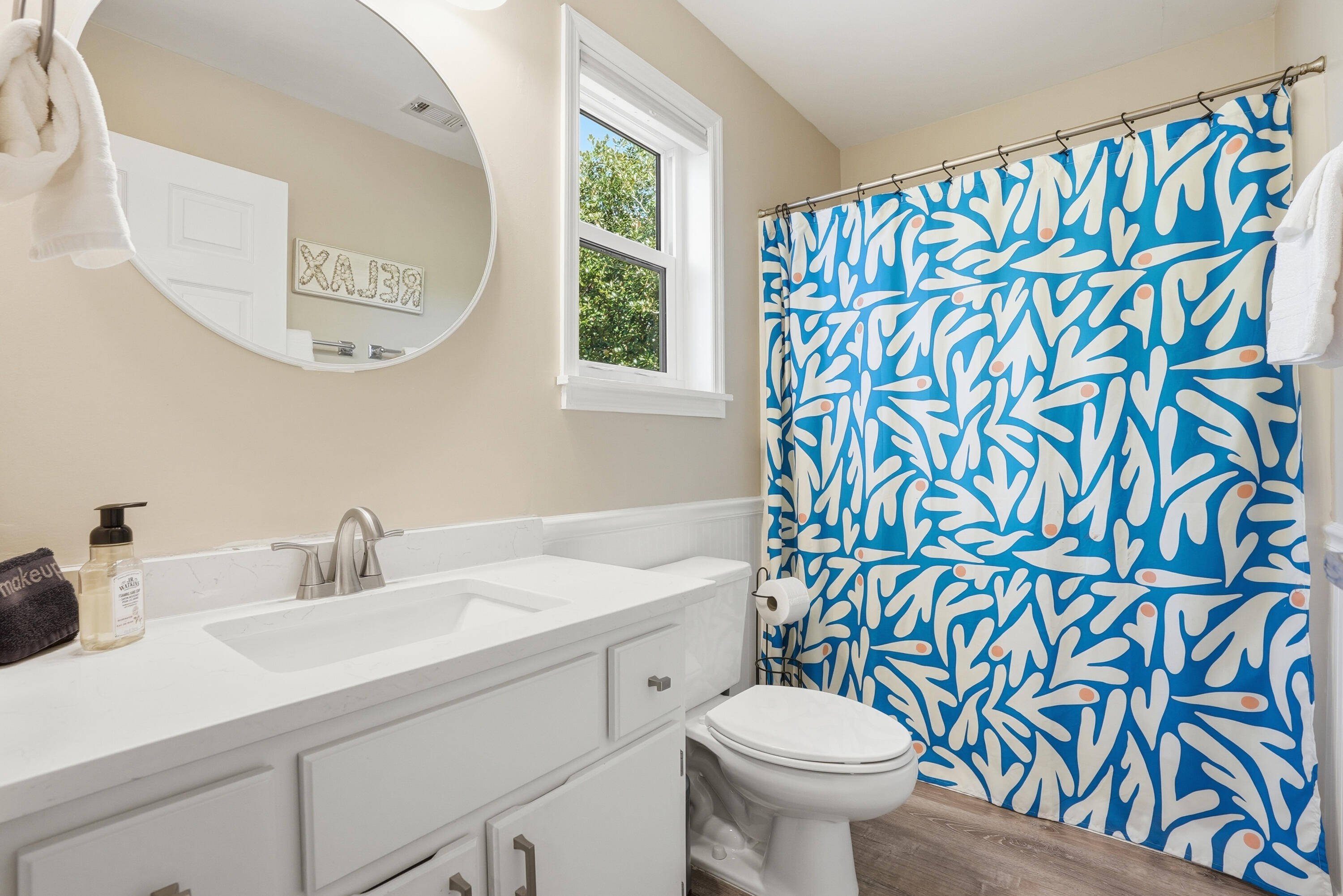 11 Beachside Drive, Unit 1214 Santa Rosa Beach, FL 32459 - Photo 20 of 28 a bathroom with a sink a toilet and a mirror