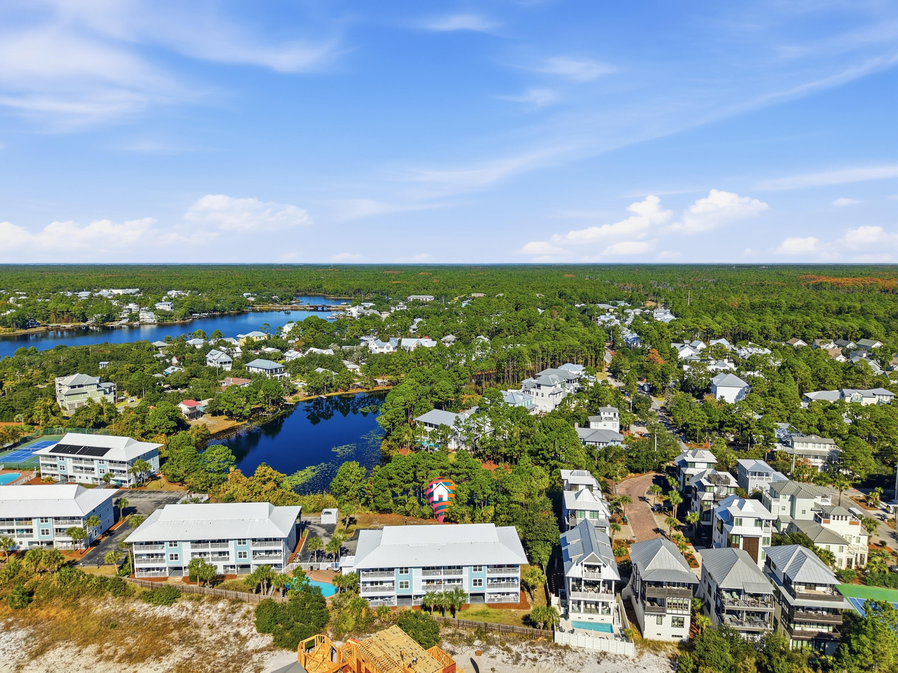 11 Beachside Drive, Unit 1214 Santa Rosa Beach, FL 32459 - Photo 25 of 28 an aerial view of residential houses with outdoor space and trees
