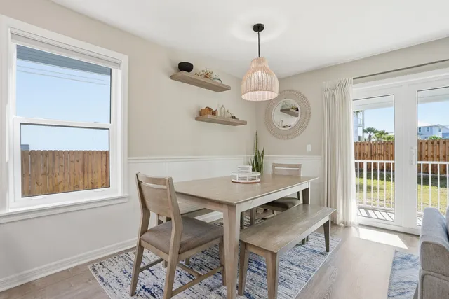 a view of a table and chairs in a room
