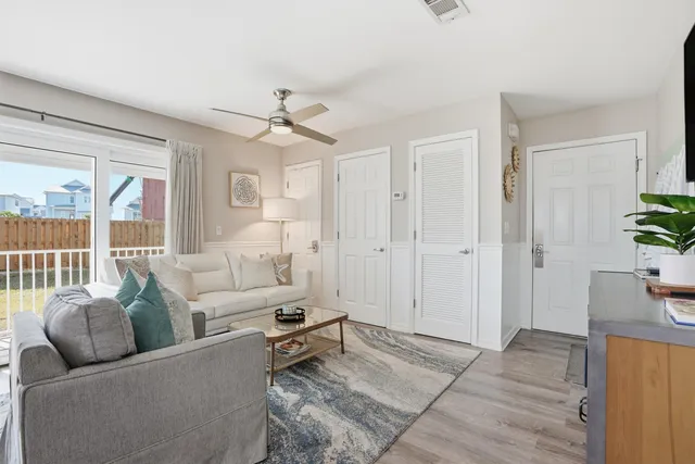 a living room with furniture and a window