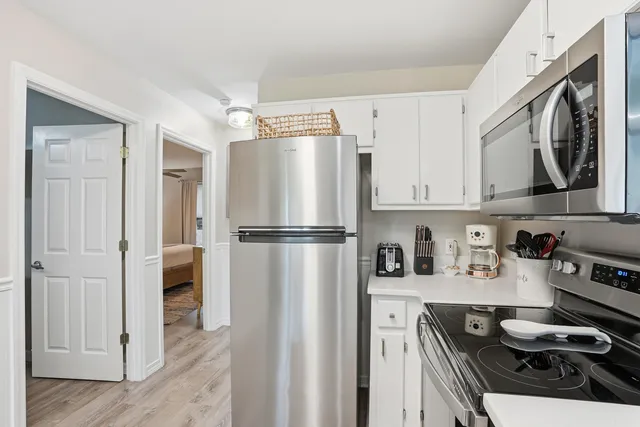 a view of a dining room with furniture