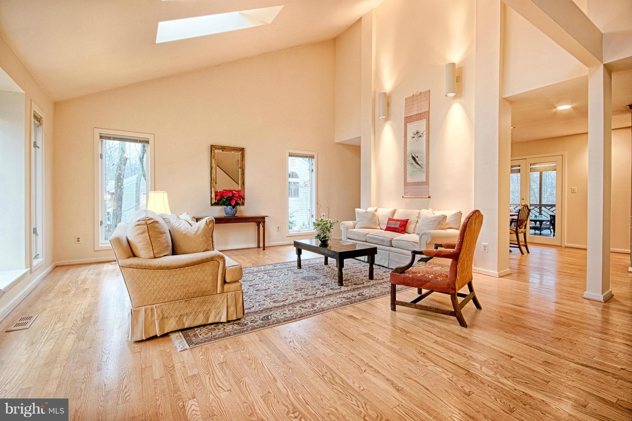 11404 Fieldstone Lane Reston, VA 20191 - Photo 4 of 30 a living room with furniture and a wooden floor