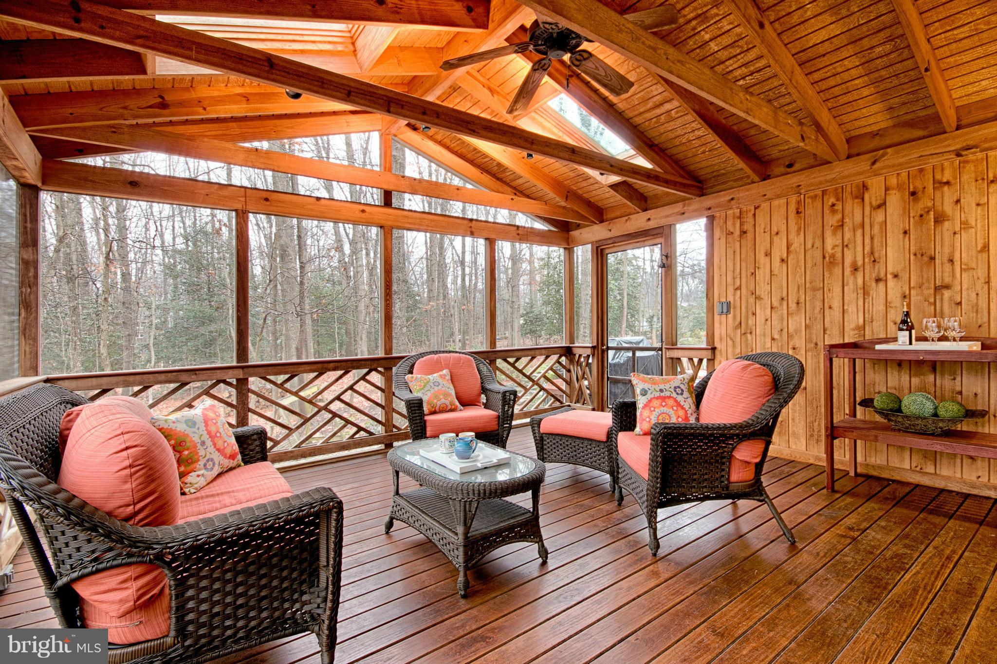 11404 Fieldstone Lane Reston, VA 20191 - Photo 8 of 30 a balcony with furniture and wooden floor