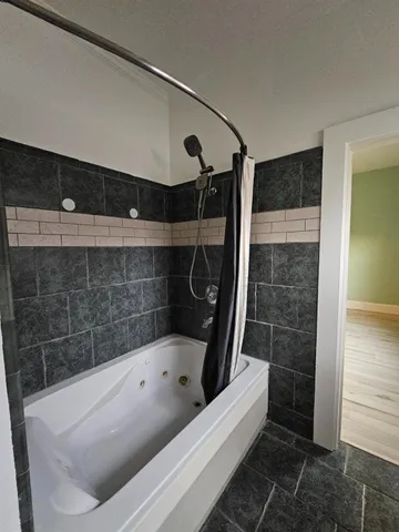 a bathroom with a bathtub