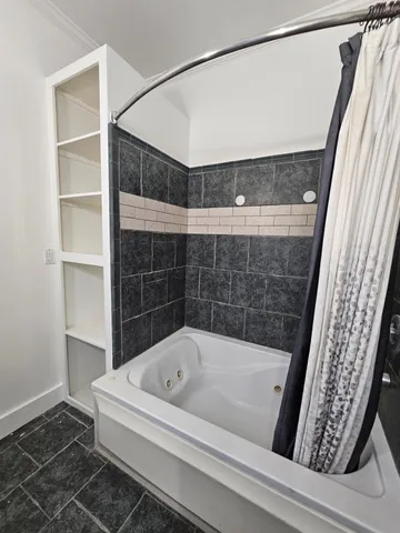 a bathroom with a bathtub