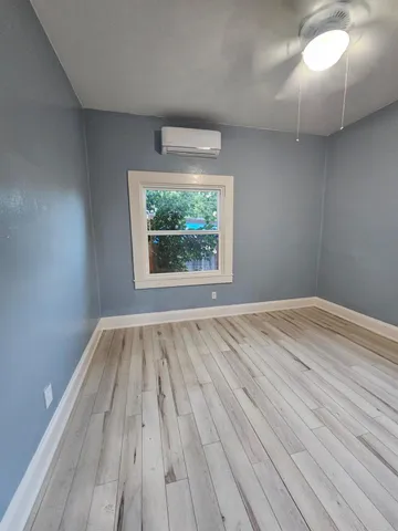 a bathroom with a glass door shower