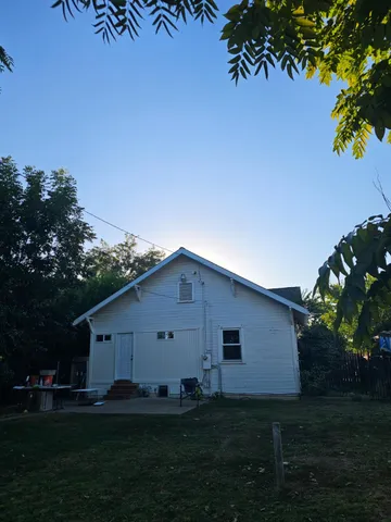a view of a living room and floor to ceiling window