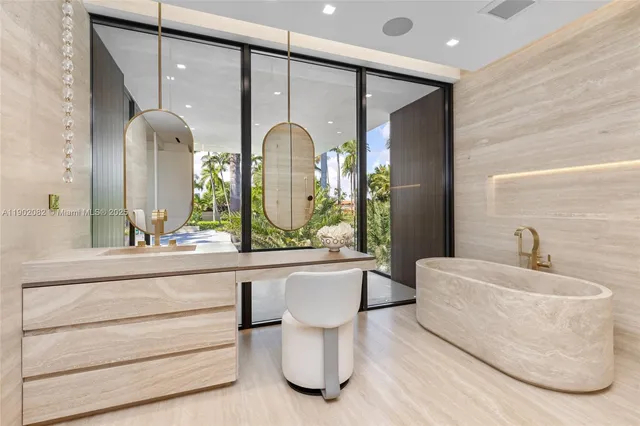 a bathroom with a granite countertop sink and a toilet