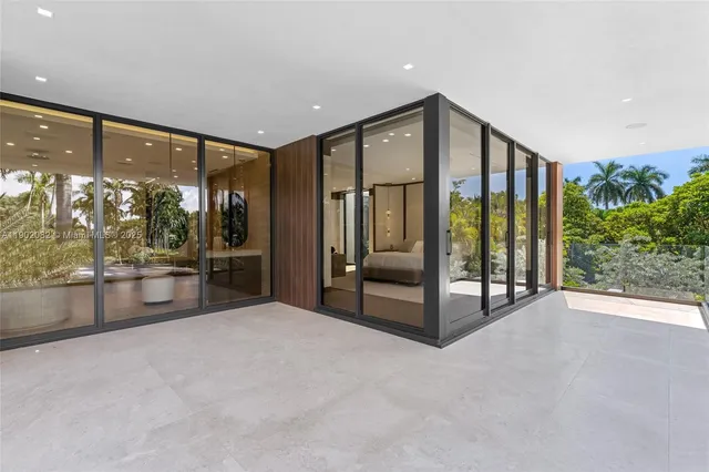 a view of a lobby with a door and windows
