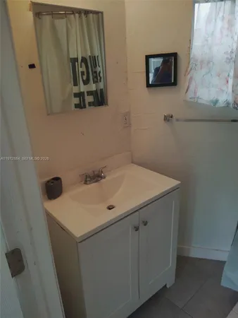 a bathroom with a toilet and a sink