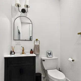 a view of a room with white walls