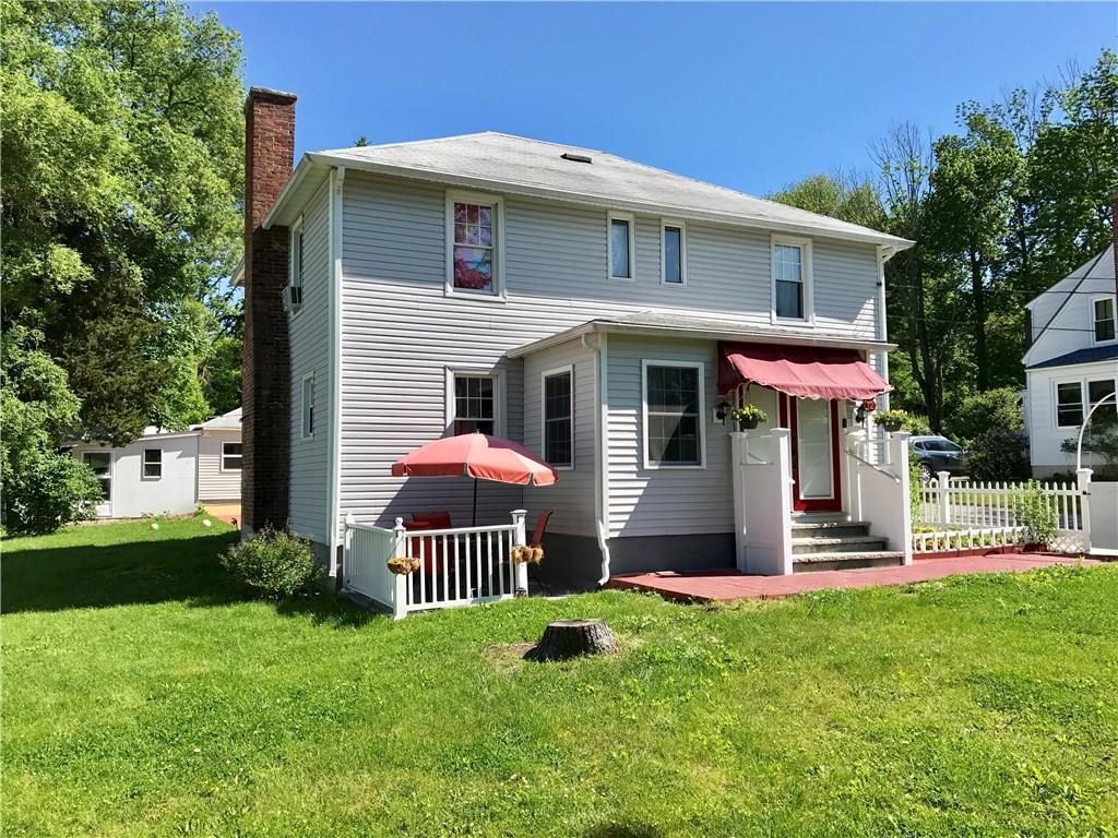 72 Ox Hill Road Norwich, CT 06360 - Photo 1 of 1 a front view of a house with a yard