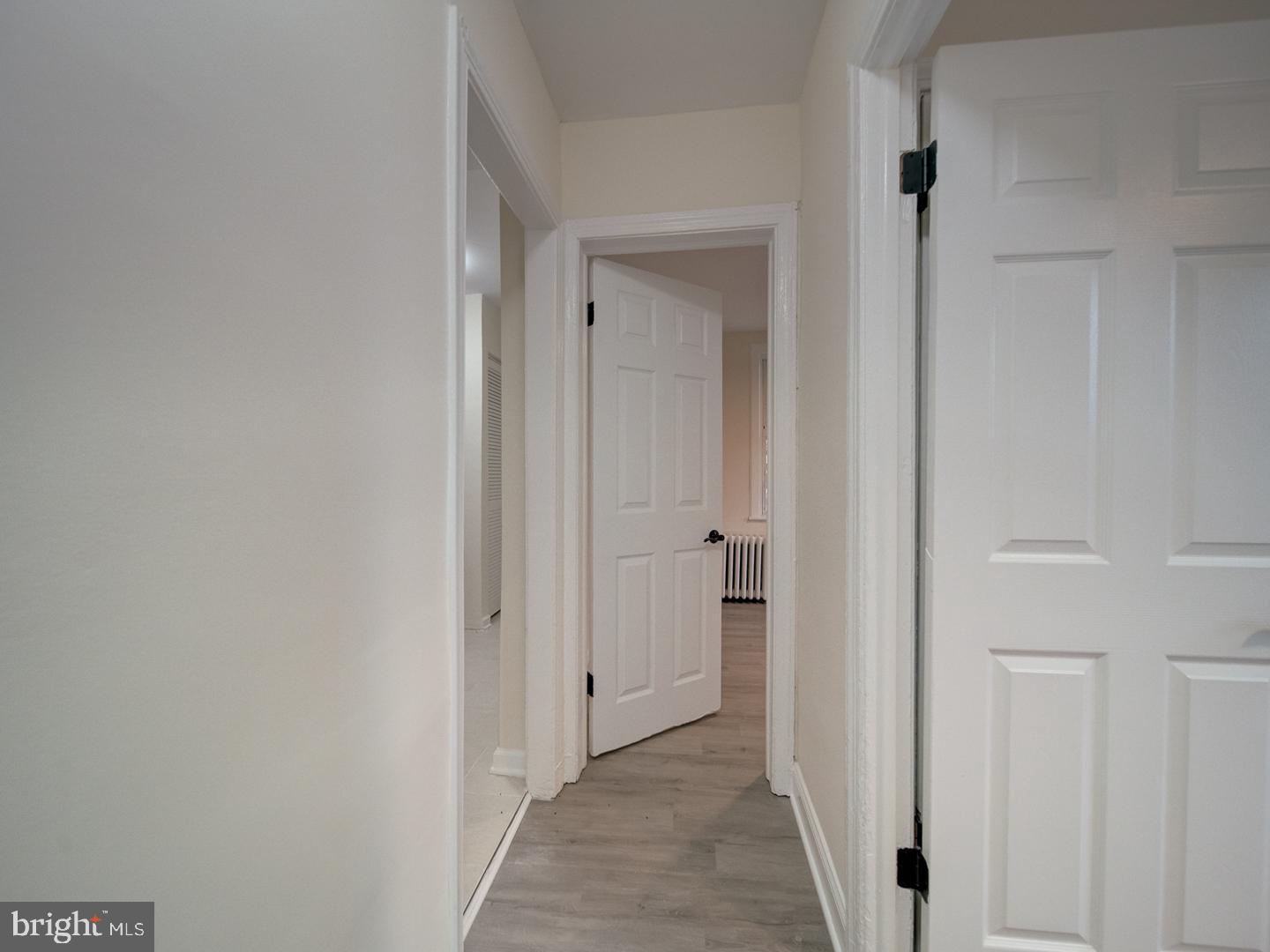 1946 I Street Northeast Washington, DC 20002 - Photo 14 of 47 a view of a hallway with a wooden door