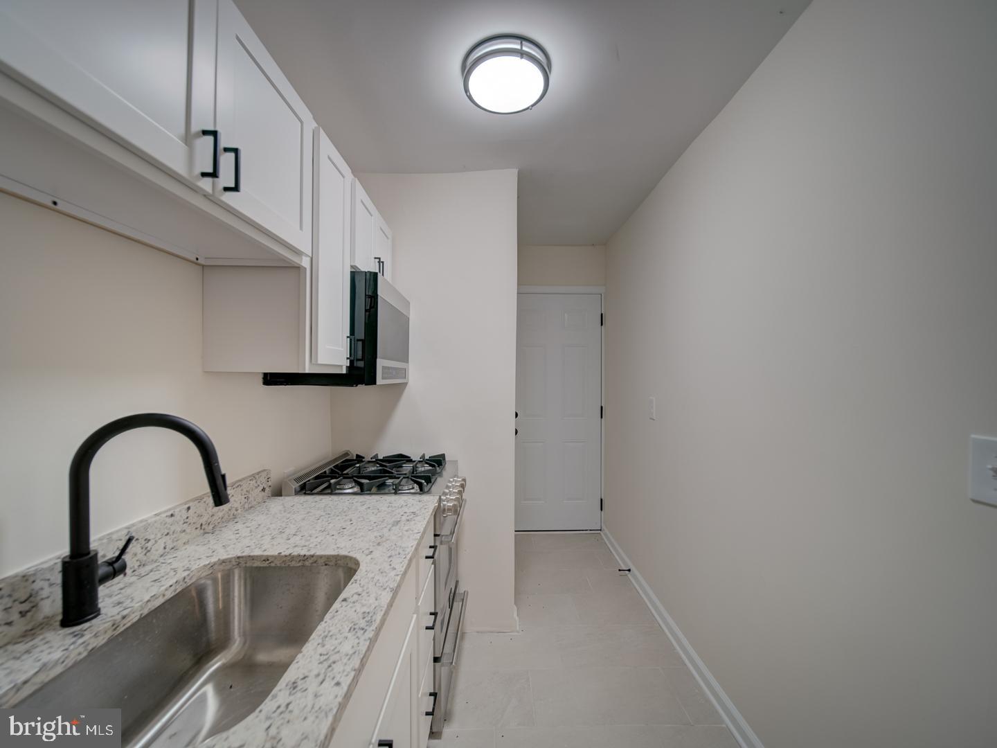 1946 I Street Northeast Washington, DC 20002 - Photo 17 of 47 a close view of sink and tap