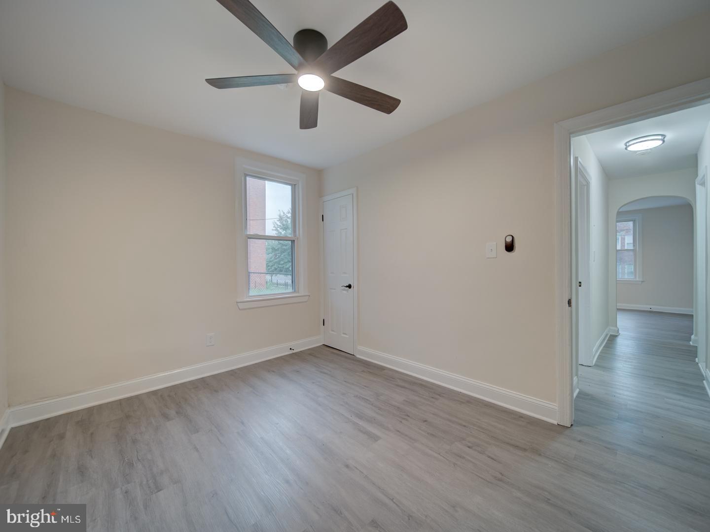 1946 I Street Northeast Washington, DC 20002 - Photo 21 of 47 wooden floor in an empty room with a window