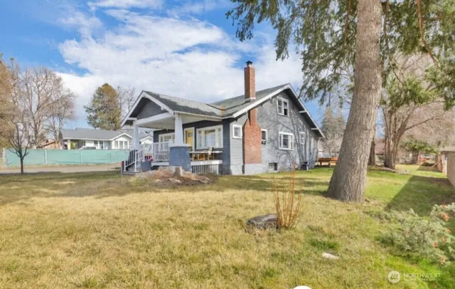 a front view of house with garden