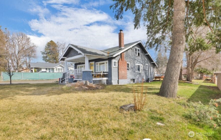 a front view of house with garden