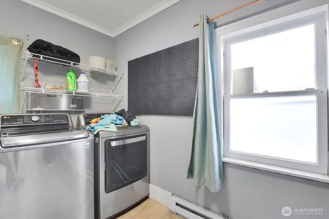 a kitchen with stainless steel appliances granite countertop a sink and a refrigerator
