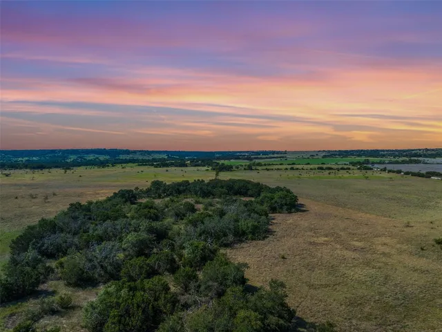 a view of a lake with a city