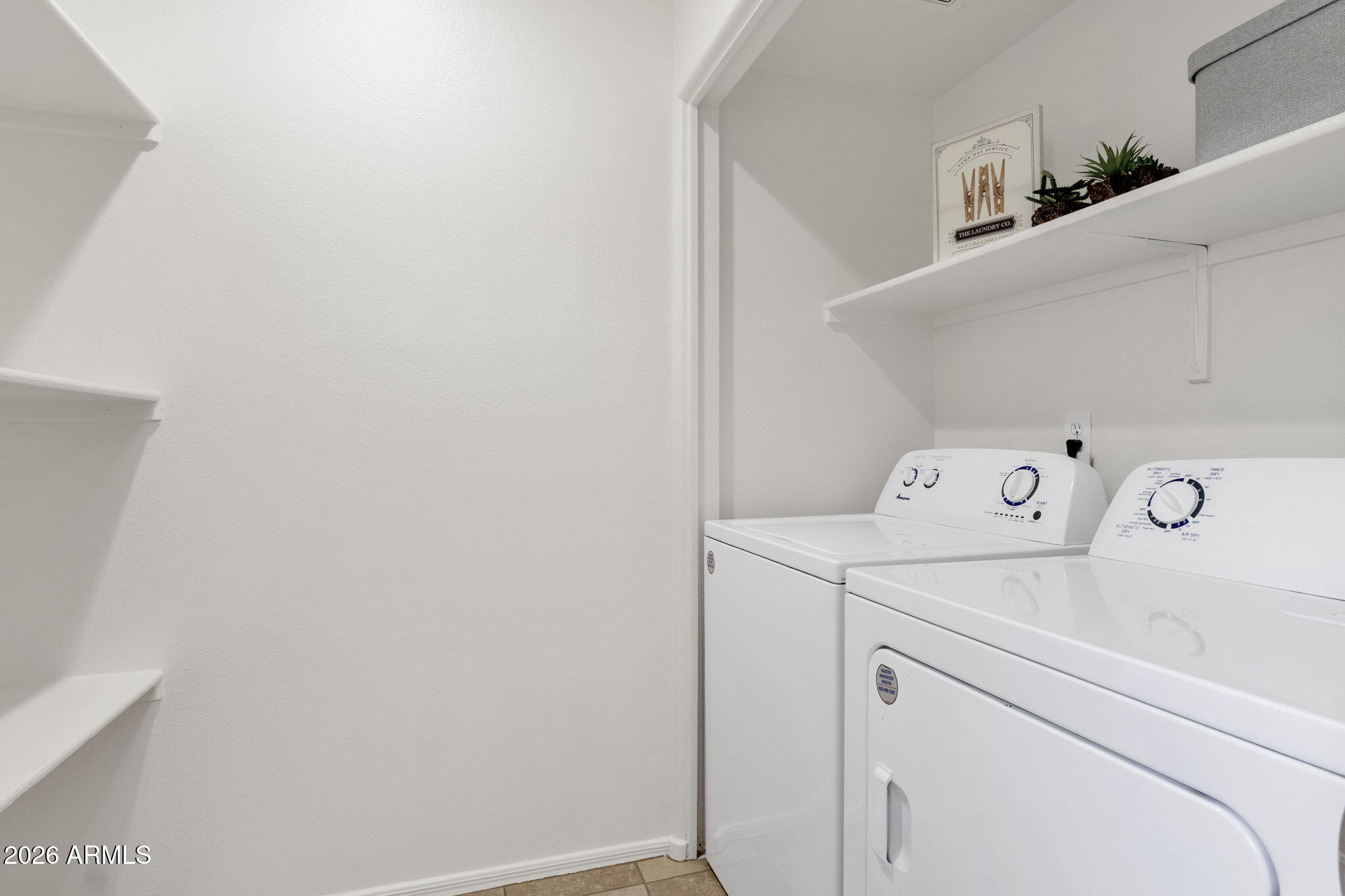 2134 East Broadway Road, Unit 2010 Tempe, AZ 85282 - Photo 12 of 42 a utility room with dryer and washer