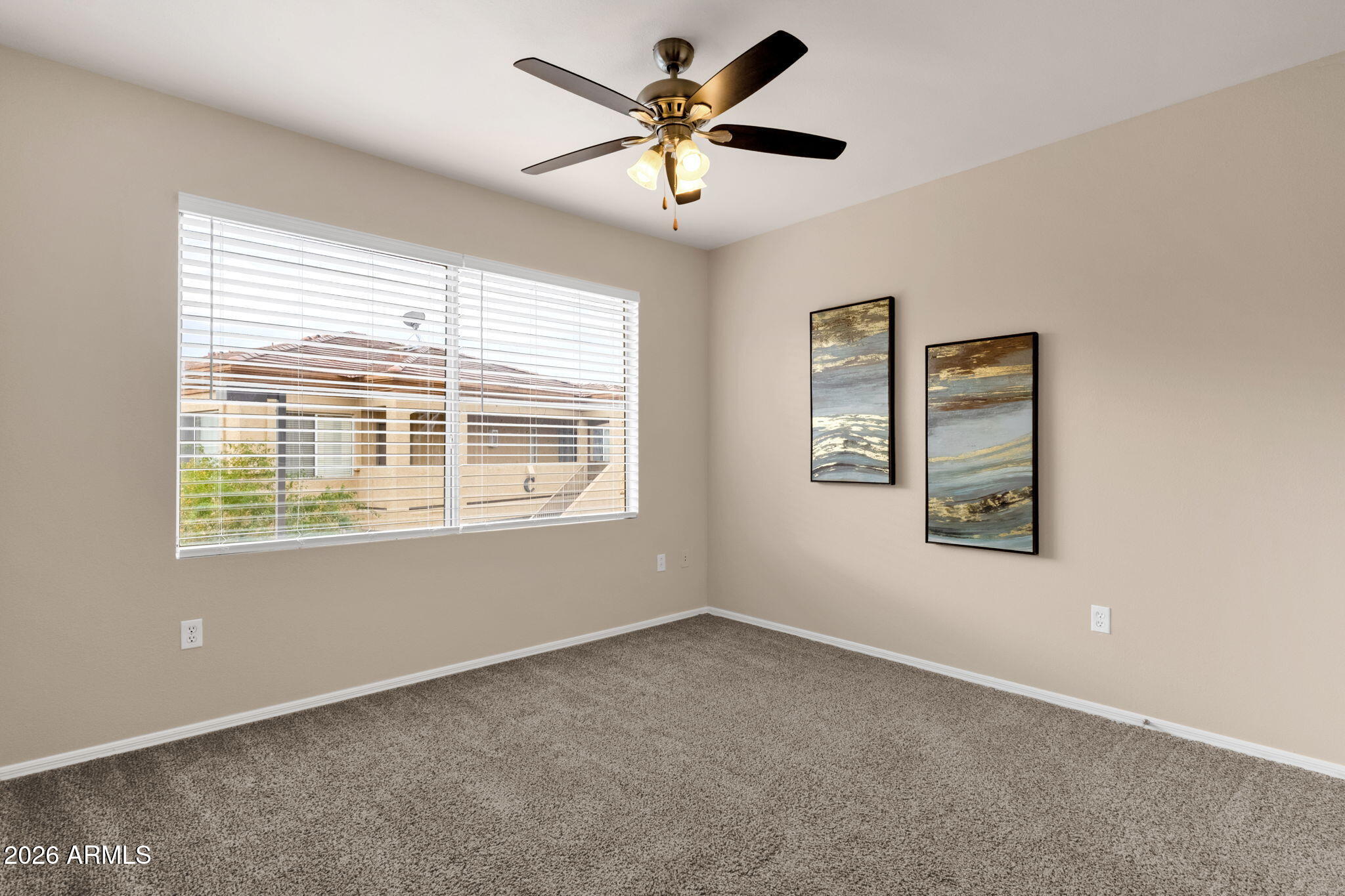 2134 East Broadway Road, Unit 2010 Tempe, AZ 85282 - Photo 22 of 42 a view of an empty room with a window