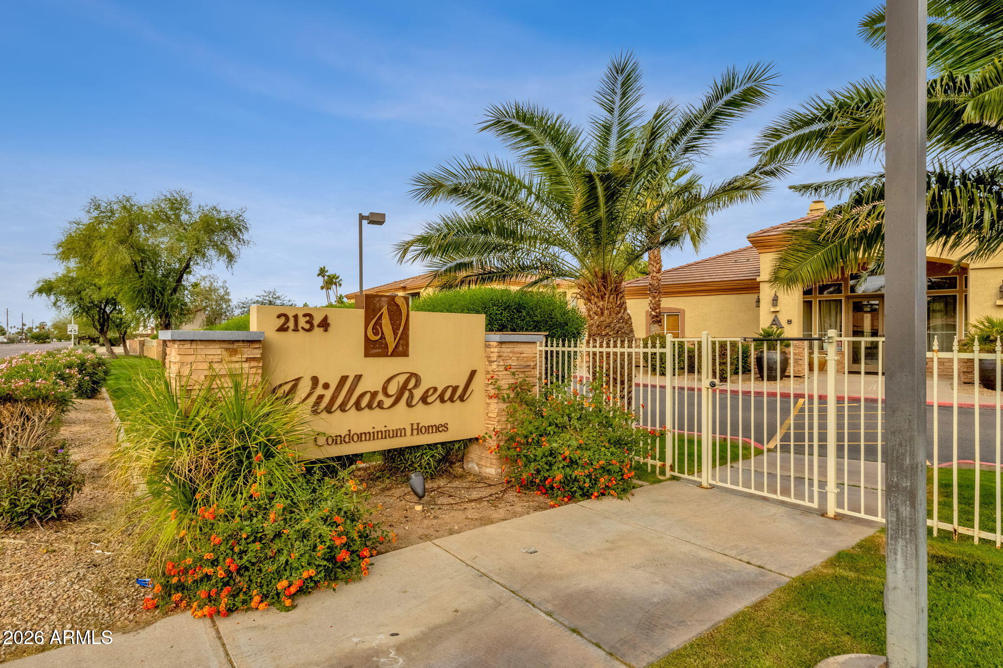2134 East Broadway Road, Unit 2010 Tempe, AZ 85282 - Photo 27 of 42 a view of a park with plants and palm trees