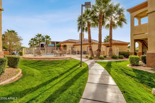a view of a swimming pool with a garden
