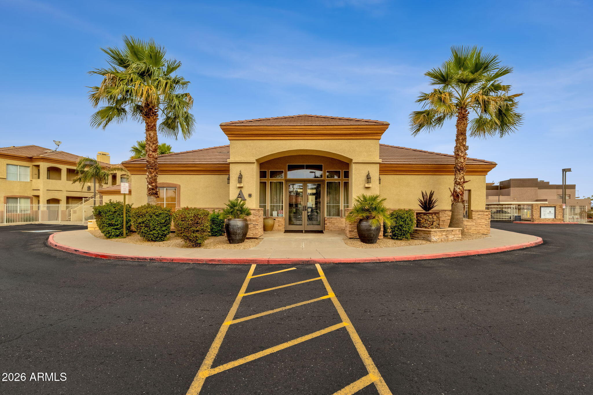 2134 East Broadway Road, Unit 2010 Tempe, AZ 85282 - Photo 41 of 42 a front view of a house with fountain