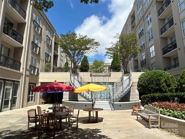 a view of a chairs and tables in the patio