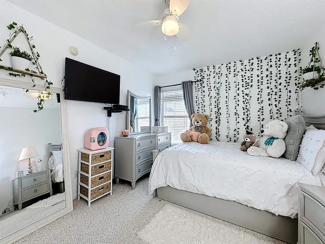a bathroom with a sink vanity and mirror