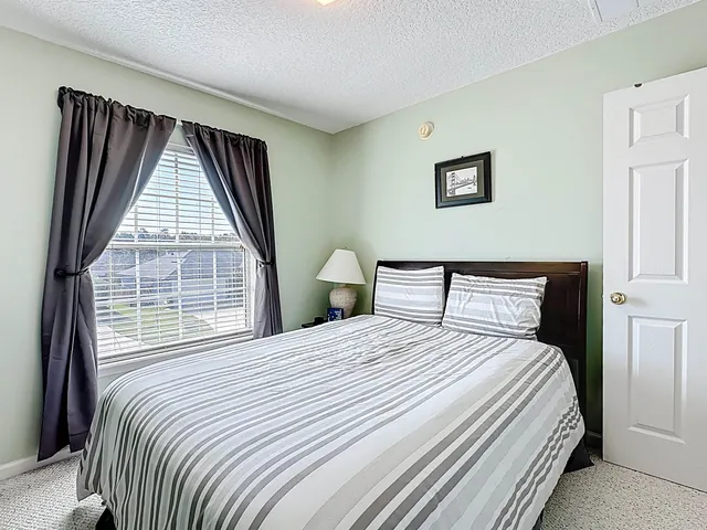 front view of a house with a swimming pool