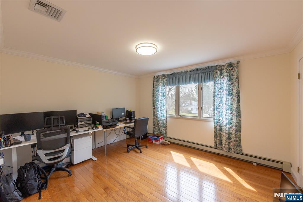 81 Crescent Avenue Mahwah, NJ 07430 - Photo 13 of 25 a view of a workspace with furniture and a window