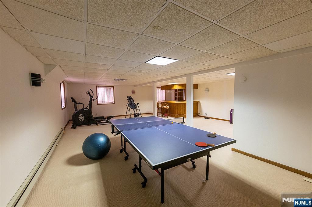 81 Crescent Avenue Mahwah, NJ 07430 - Photo 18 of 25 a room with furniture and wooden floor