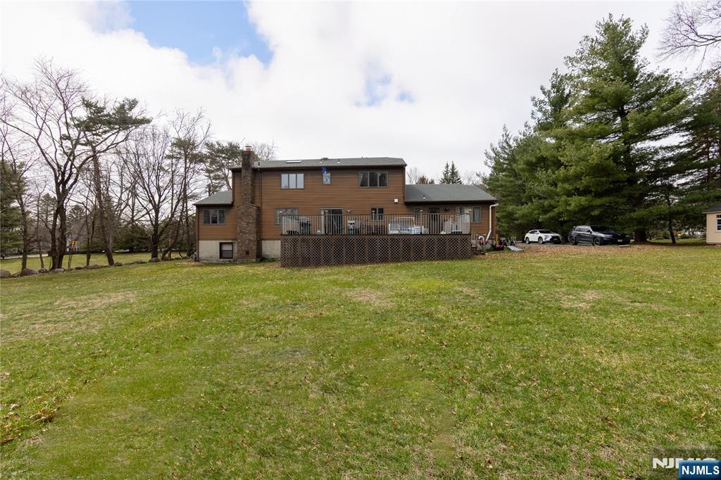81 Crescent Avenue Mahwah, NJ 07430 - Photo 20 of 25 a view of a house with a yard
