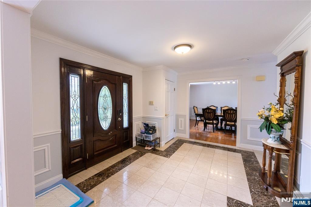81 Crescent Avenue Mahwah, NJ 07430 - Photo 2 of 25 a view of a livingroom with furniture and a fireplace