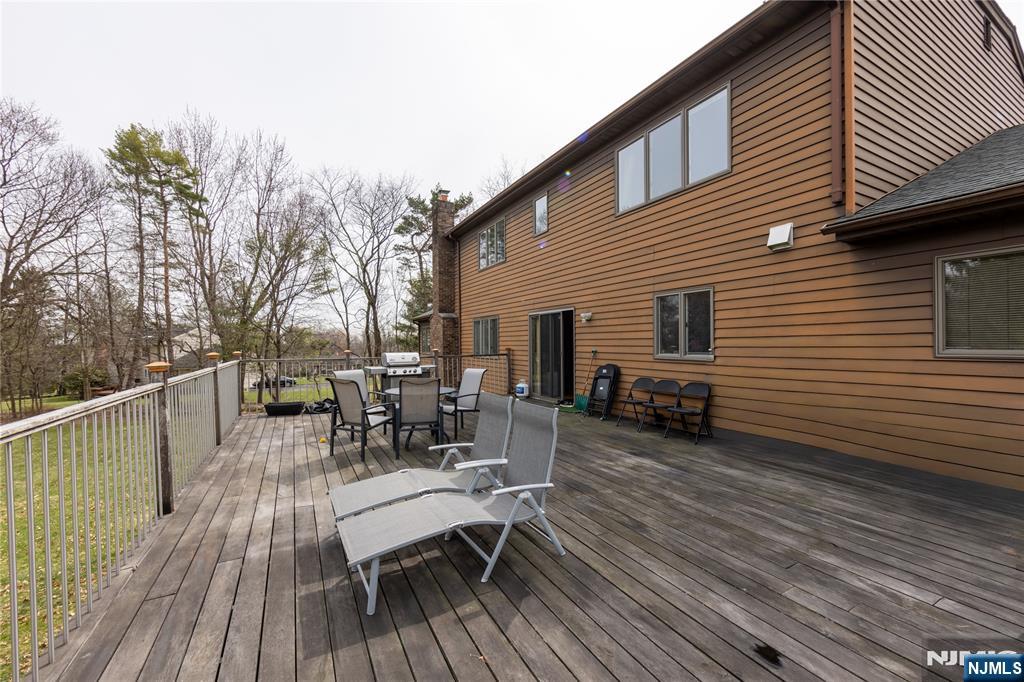 81 Crescent Avenue Mahwah, NJ 07430 - Photo 21 of 25 a view of a house with sitting area and wooden floor