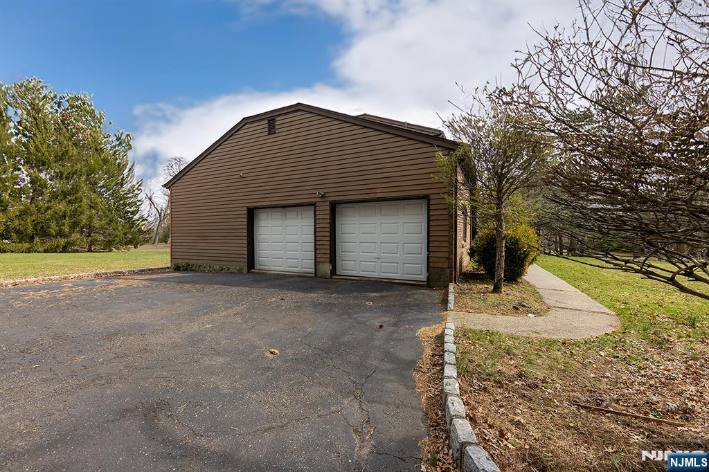 81 Crescent Avenue Mahwah, NJ 07430 - Photo 22 of 25 a view of a house with backyard