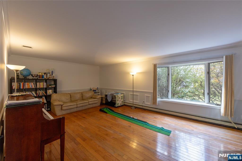 81 Crescent Avenue Mahwah, NJ 07430 - Photo 4 of 25 a living room with furniture and a large window