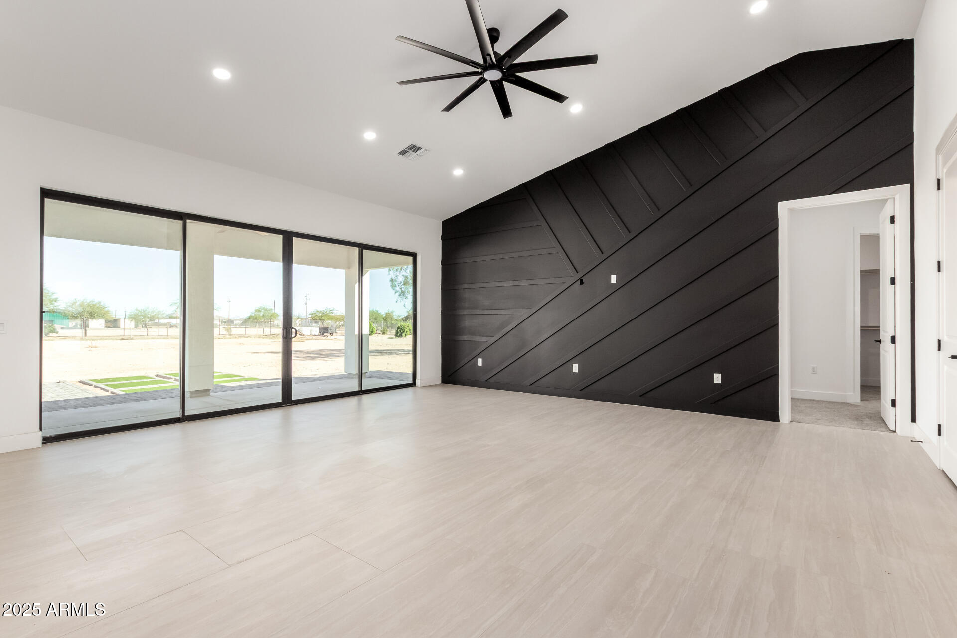 681 North Bruner Road Buckeye, AZ 85396 - Photo 11 of 60 a view of an empty room with a window