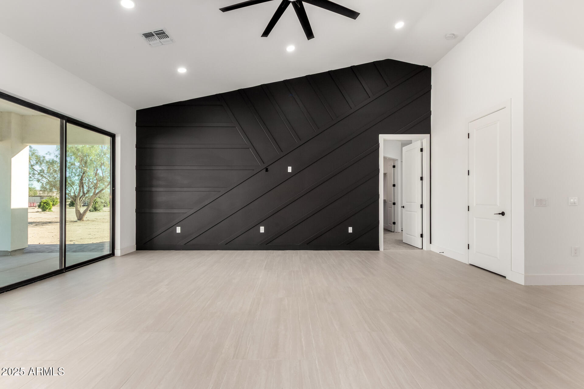 681 North Bruner Road Buckeye, AZ 85396 - Photo 14 of 60 a view of an empty room with a window