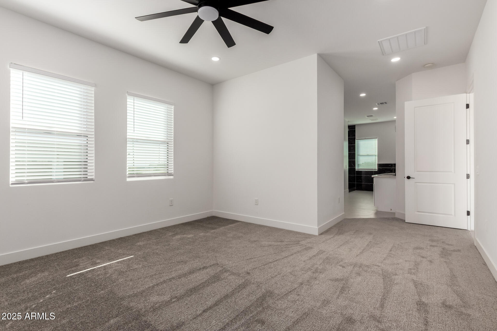 681 North Bruner Road Buckeye, AZ 85396 - Photo 23 of 60 a view of an empty room with a window
