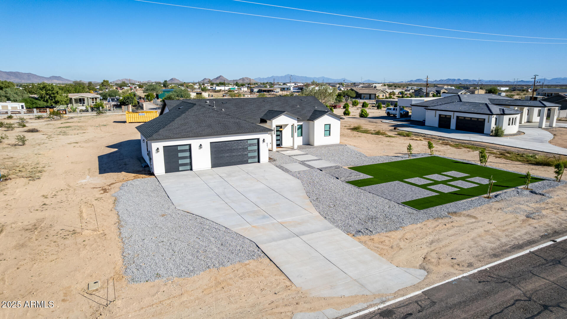 681 North Bruner Road Buckeye, AZ 85396 - Photo 44 of 60 an aerial view of a house with a yard