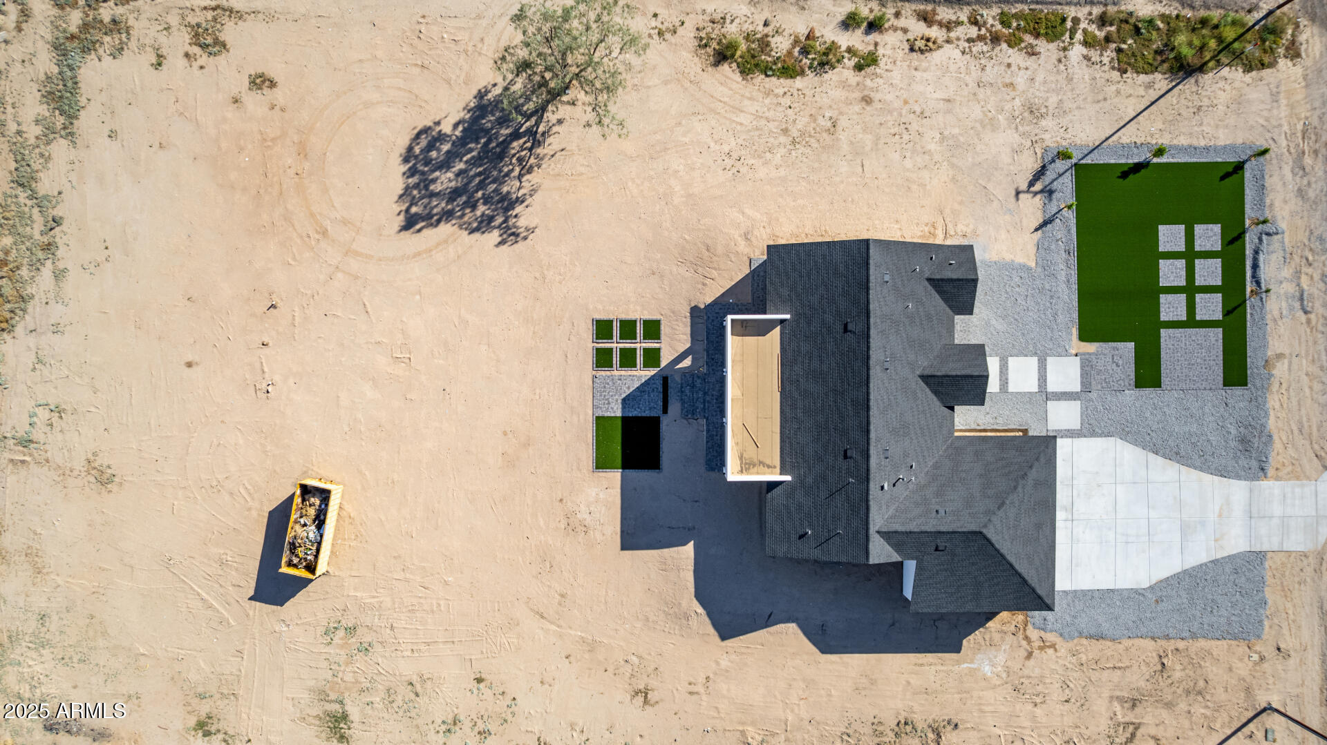 681 North Bruner Road Buckeye, AZ 85396 - Photo 52 of 60 a front view of a house with a yard