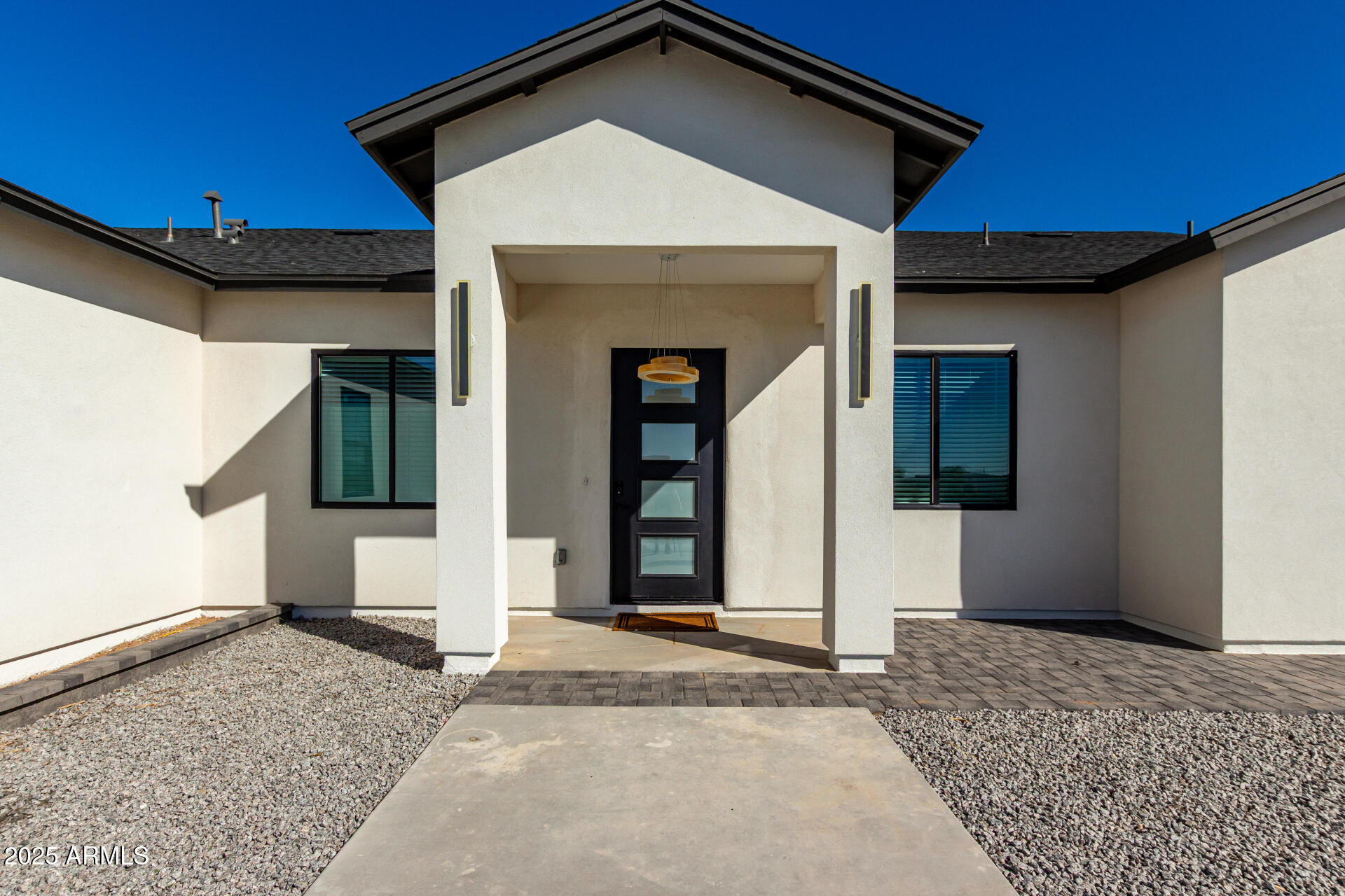 681 North Bruner Road Buckeye, AZ 85396 - Photo 7 of 60 a view of a house with wooden floor and a window