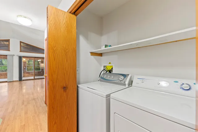 a utility room with dryer and washer