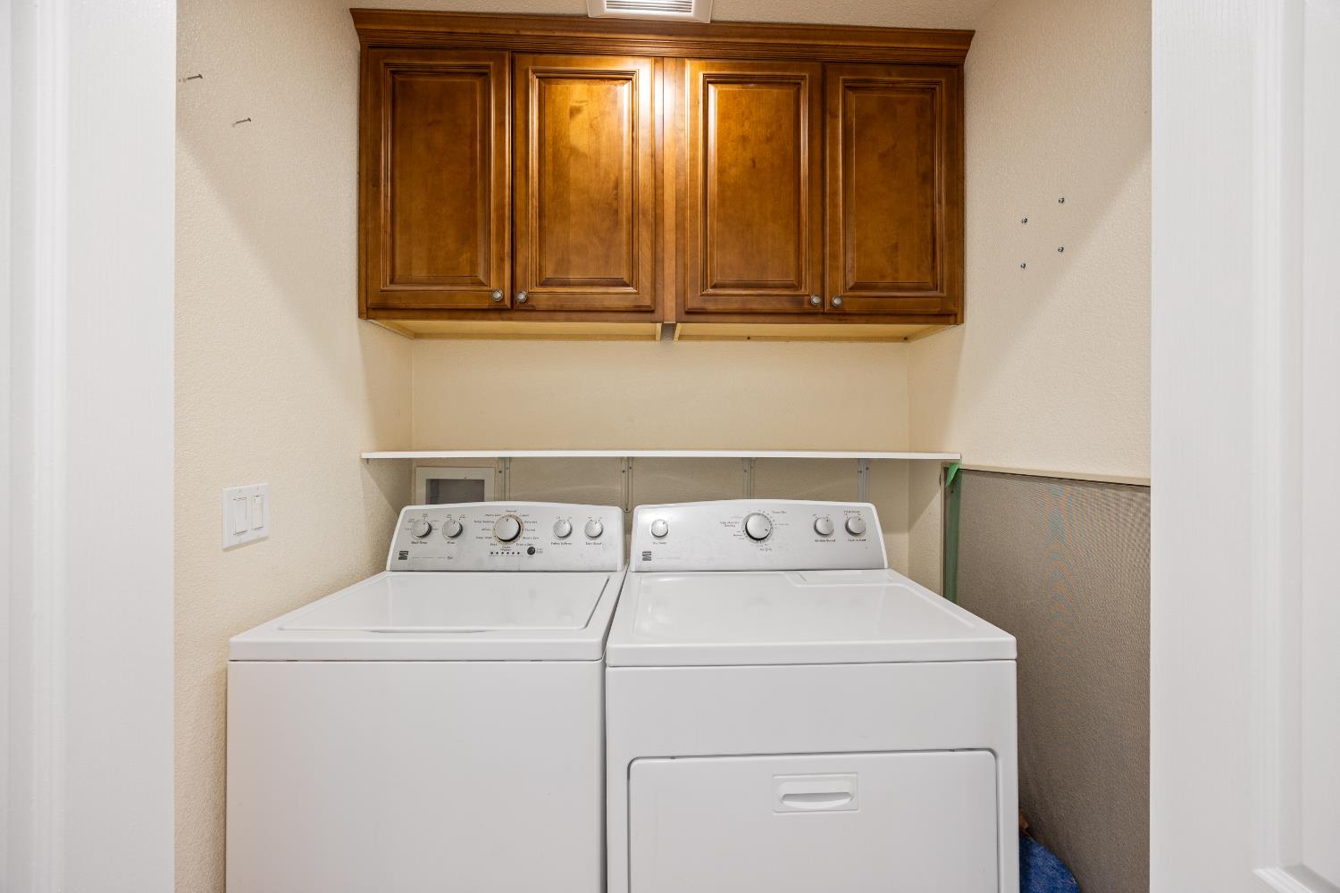 8009 Spring Valley Road Pollock Pines, CA 95726 - Photo 14 of 31 a utility room with dryer and washer