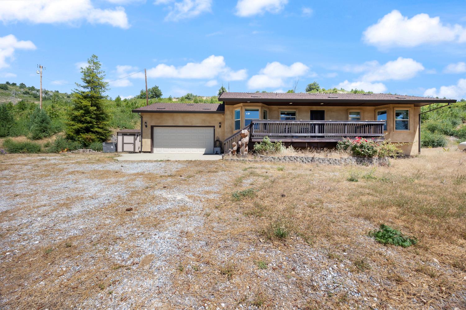8009 Spring Valley Road Pollock Pines, CA 95726 - Photo 2 of 31 a view of house with outdoor space and sitting space