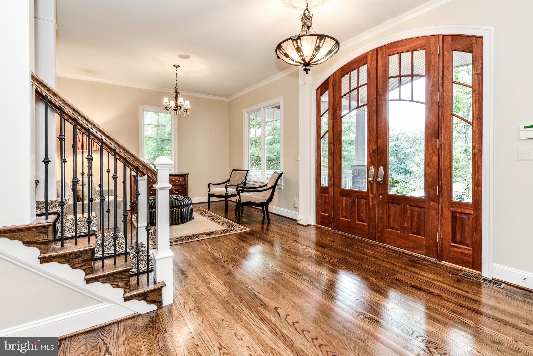 306 Ayito Road Southeast Vienna, VA 22180 - Photo 3 of 82 Custom door with hardwood entry