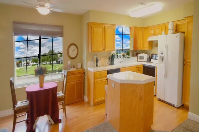 a very nice looking dining room with a large window
