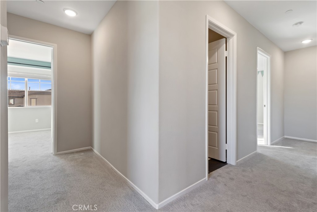 6291 Botanic Road Banning, CA 92220 - Photo 24 of 40 Bedroom 2 on the left - Hall to other rooms